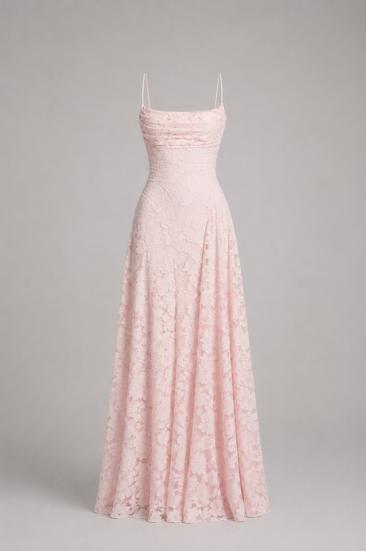 A light pink lace spaghetti-strap maxi dress with a ruched bodice, displayed on a neutral gray background.