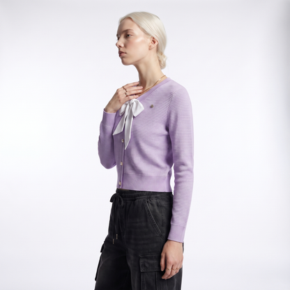 Lilac waffle knit cardigan, side view showing the fitted sleeve