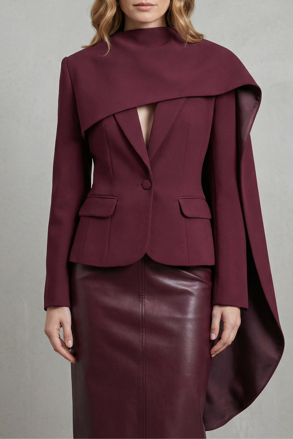 Women's burgundy asymmetric blazer with draped scarf lapel, front view