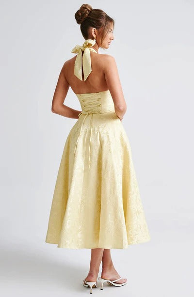 Close-up detail of the lemon halter floral midi dress