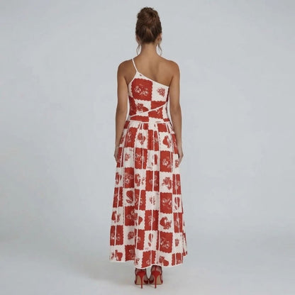 Women's patchwork floral one-shoulder maxi dress in red and white, back view with scalloped trim