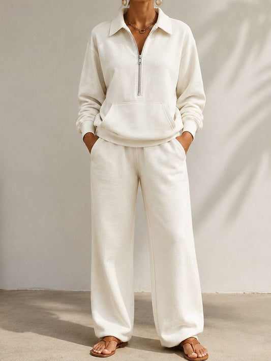 Women's white v-neck zip front two piece set, detail view showing zip front