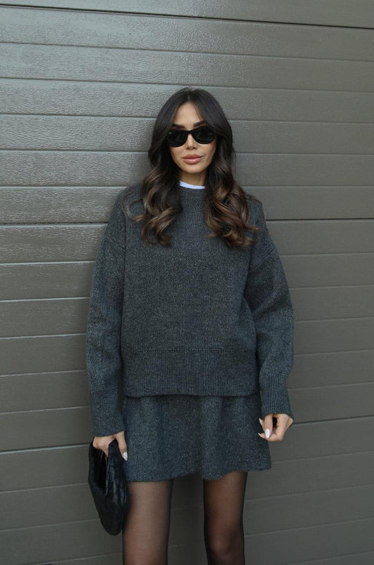 Women's grey two piece skirt set with crew neck long sleeve top