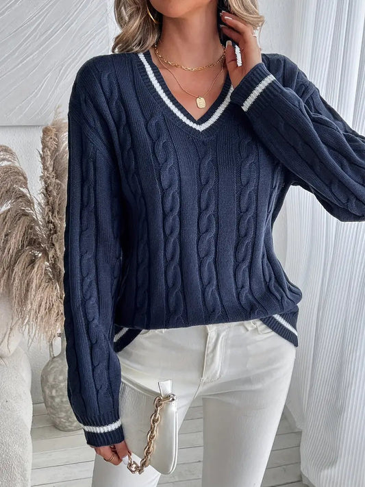 Women's navy V-neck cable knit sweater with white stripe trim, front view